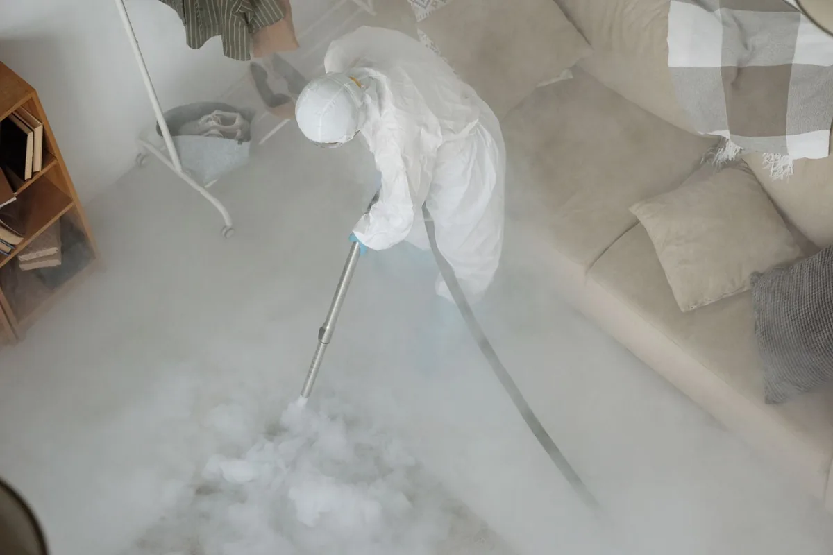 Biohazard cleanup technician in protective equipment, Parkesburg, PA